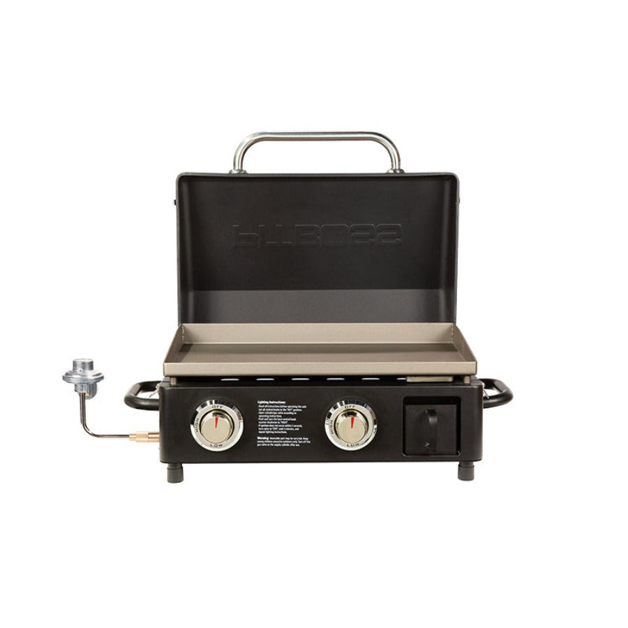 lifestyle_1, Black griddle with silver accents and white lettering. Grill hood open