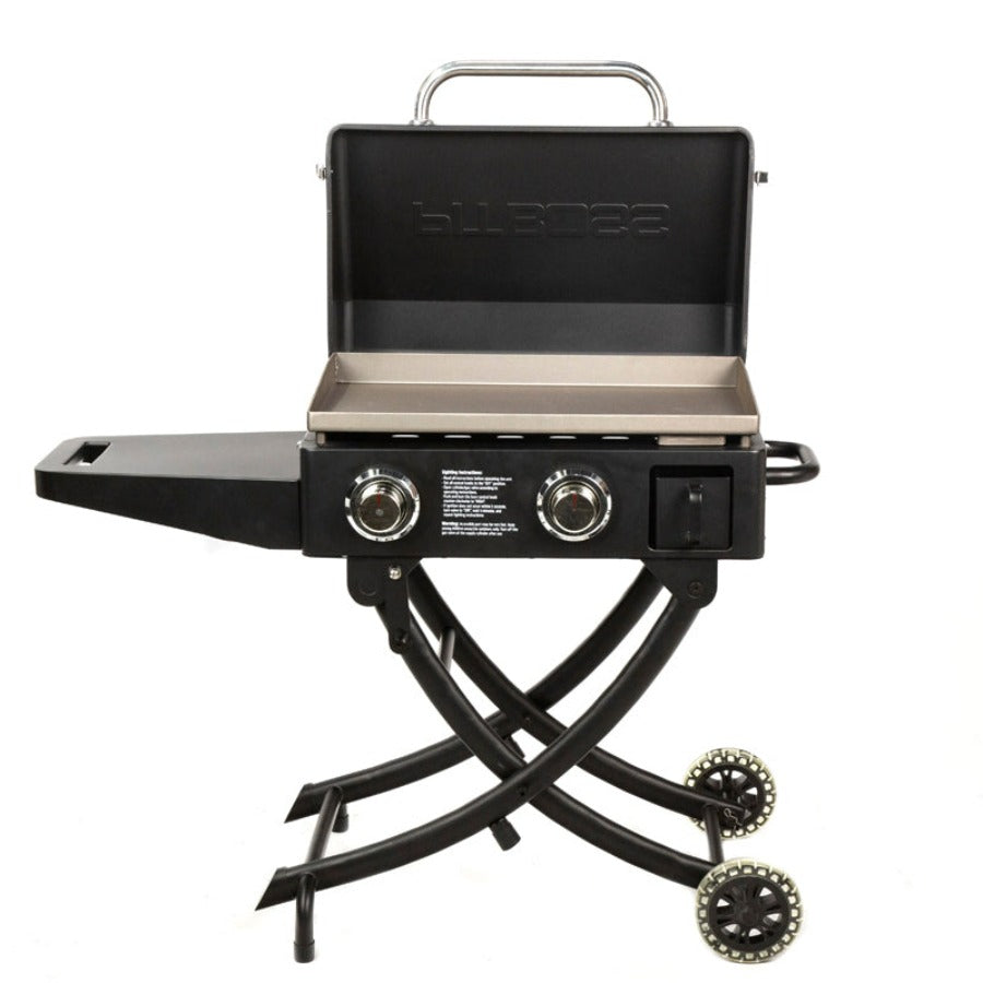 lifestyle_1, All black griddle with silver accents and white lettering w engraved Pit Boss logo. Grill hood open