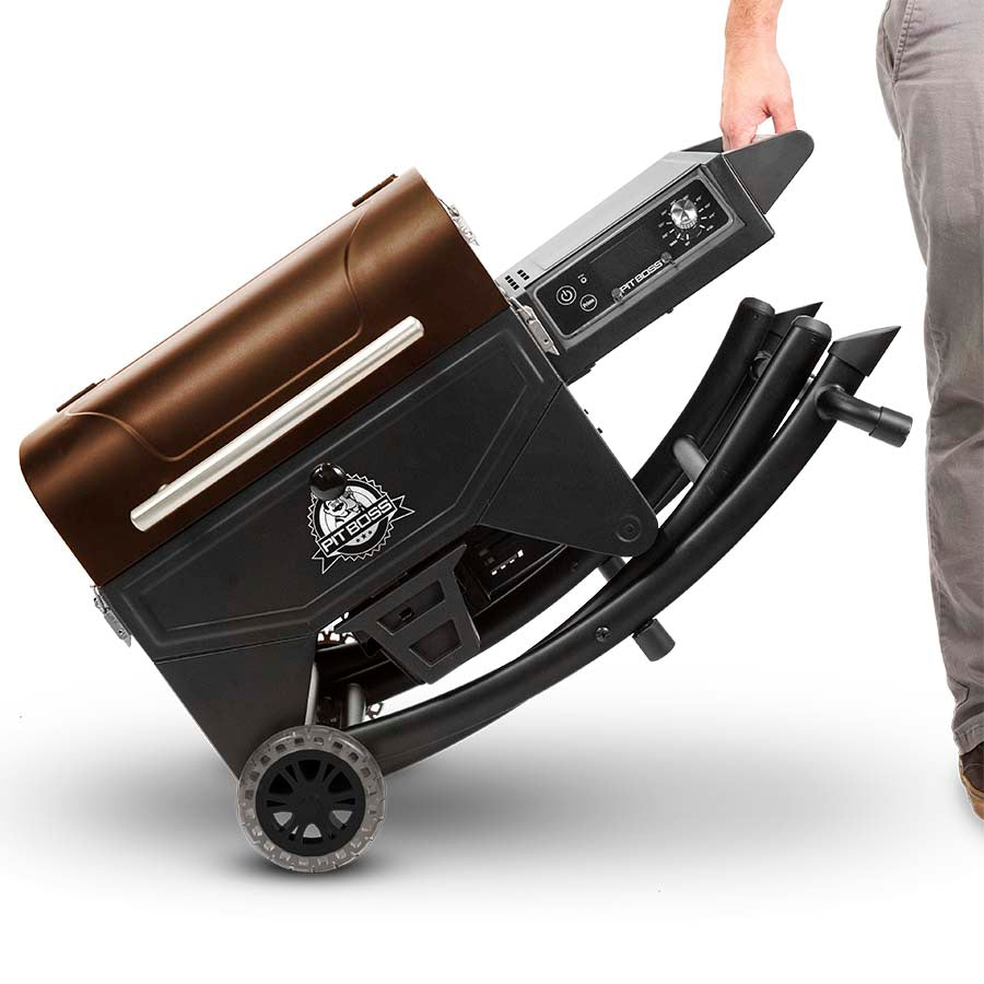 Dark brown and black grill with silver accents, clear wheels and a pit boss logo. Folded up, being wheeled away