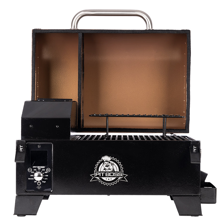 lifestyle_1, Black grill with orangeish-brown grill hood and silver accents with Pit Boss logo.  Grill hood open.