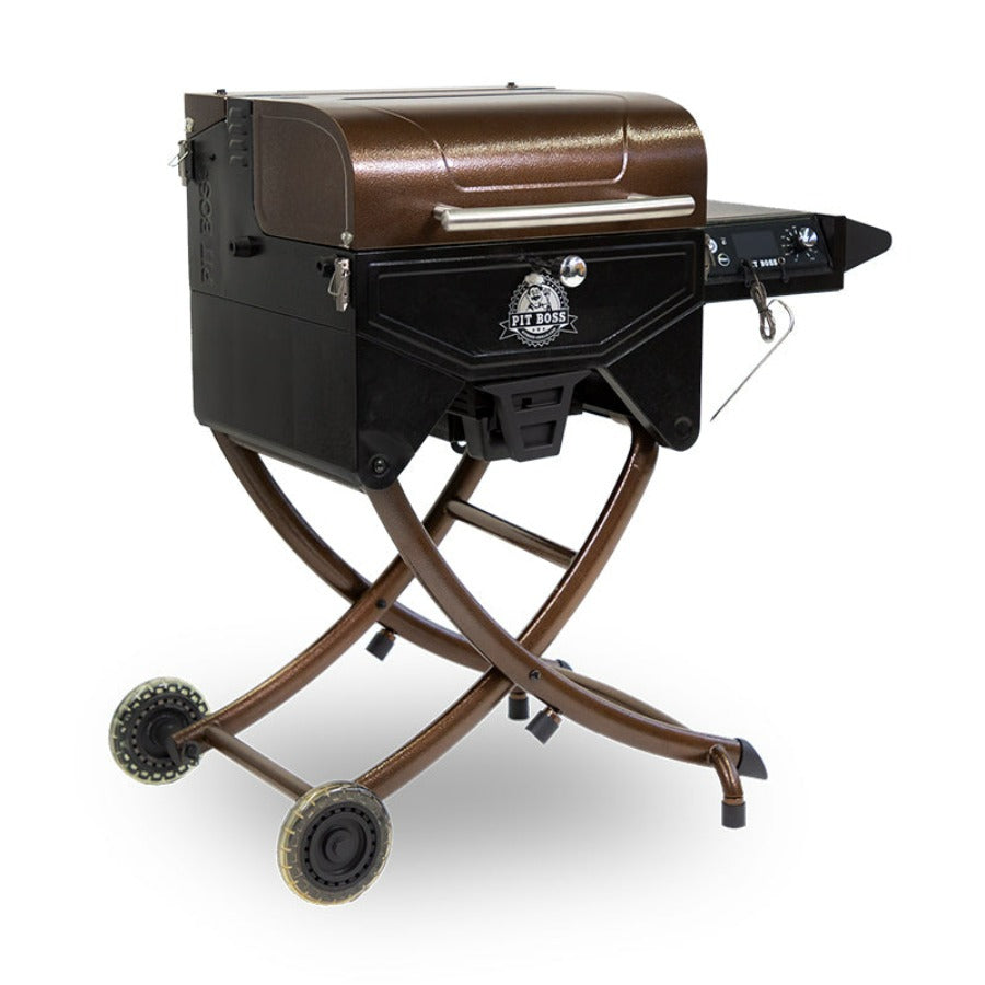 lifestyle_1, Dark brown and black grill with silver accents, clear wheels and a pit boss logo. Side angle view