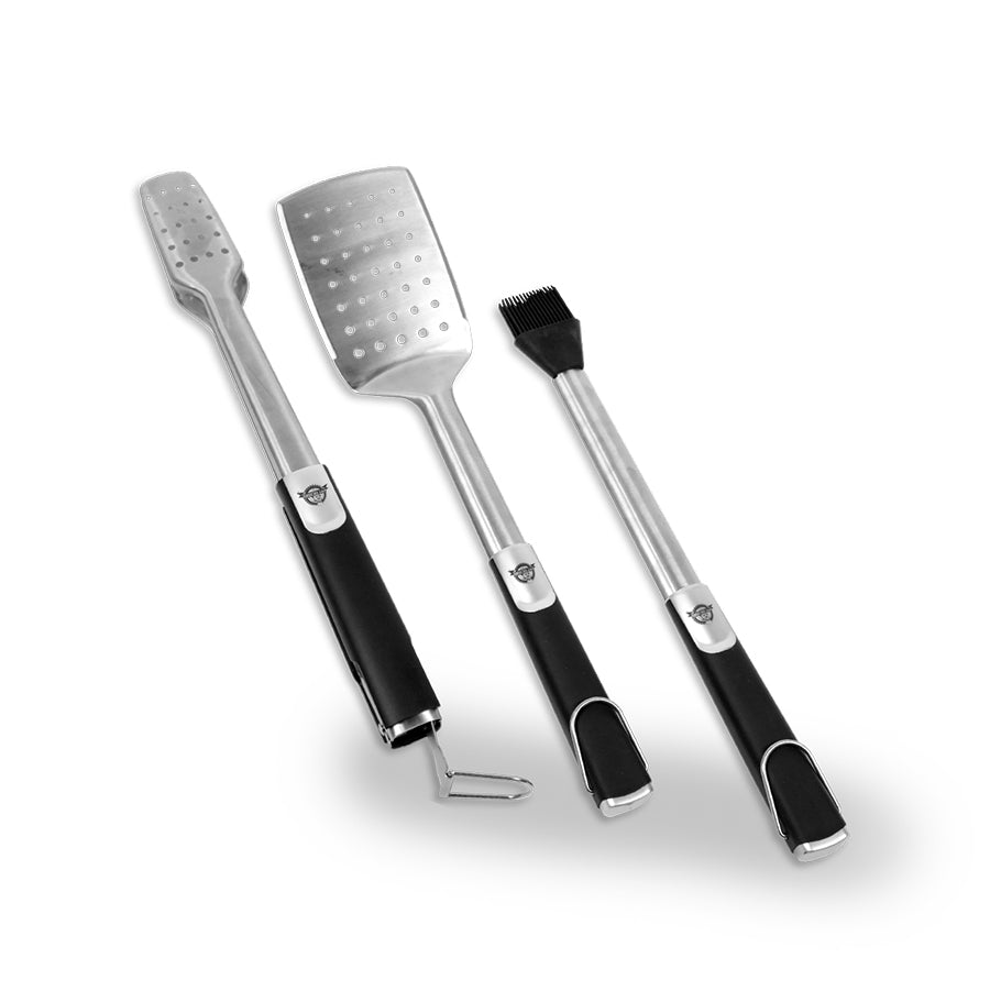 lifestyle_2, silver and black utensils with pit boss logo on handles