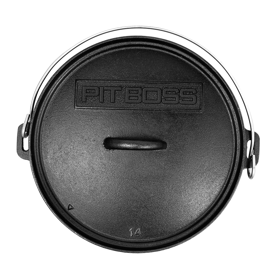 lifestlye_1, Round, black dutch oven with feet and loops with metal handle. Birds eye view of lid with handle and raised "pit boss" lettering logo