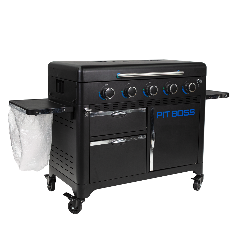 lifestyle_4, Black griddle with bright blue and silver accents with large blue "pit boss" logo. Shown with trash bag holder and trash bag