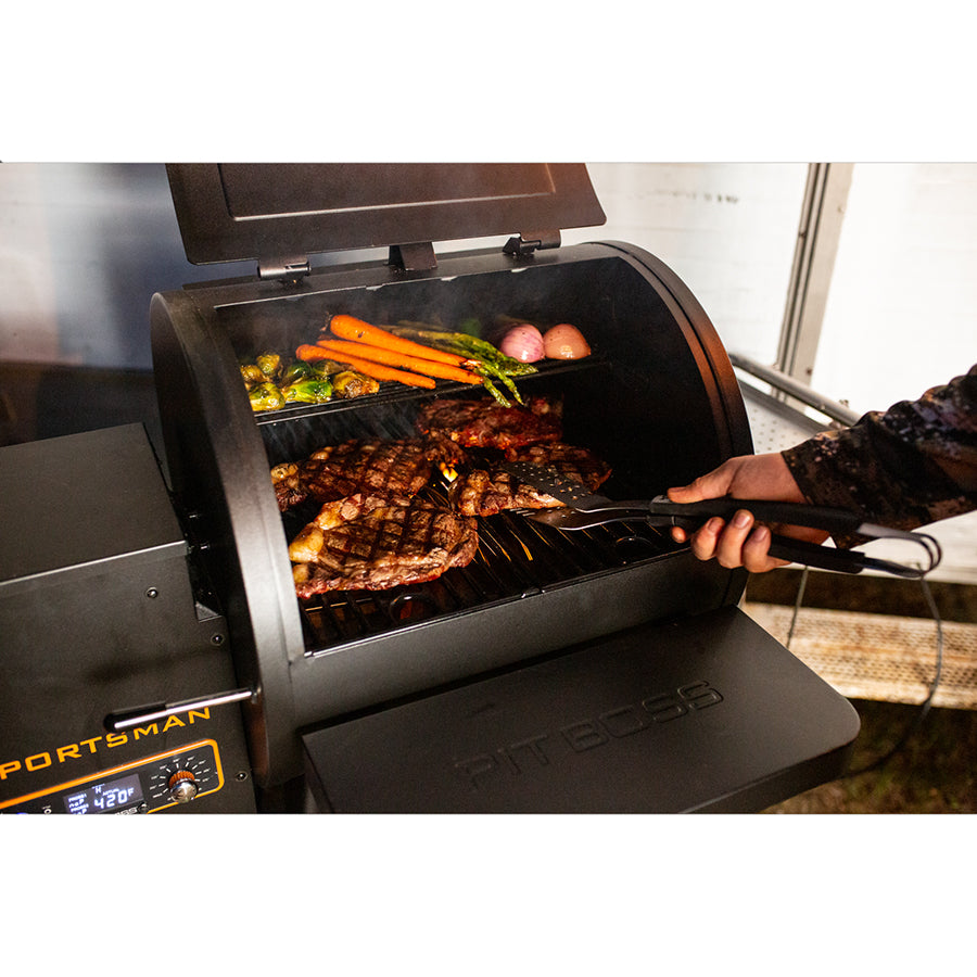 lifestyle_2, meats and veggies grilling on sportsman grill with all-in-one tool