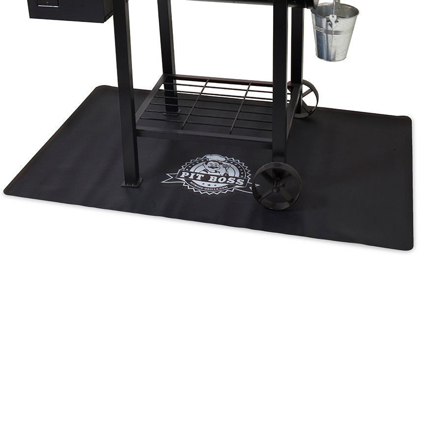lifestyle_1, Grill on top of black, rectangular mat with white pit boss logo