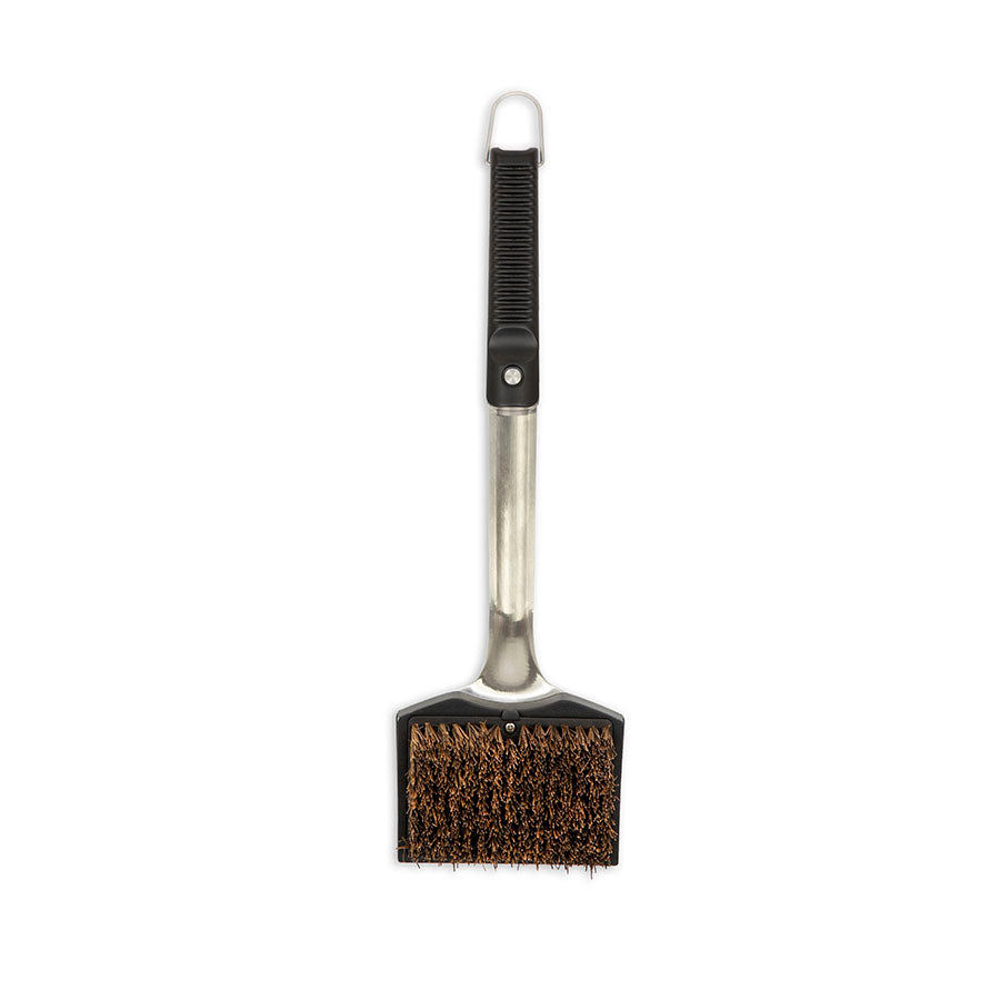 lifestyle_1, Silver brush with back handle and small pit boss logo front side. Back side where bristles shown
