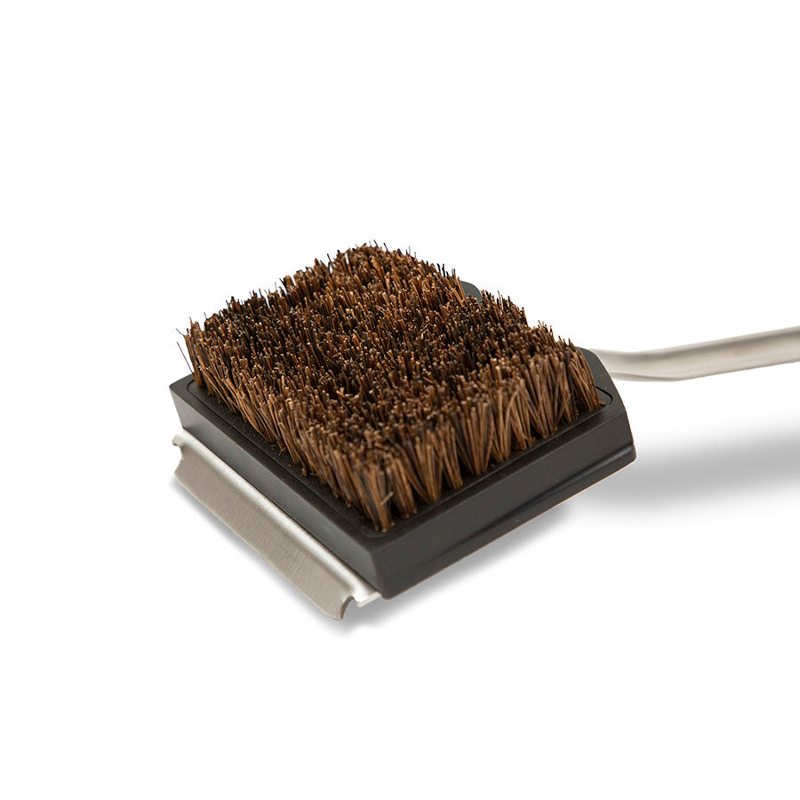 lifestyle_2, up close of brush head with brown bristles and silver scraper