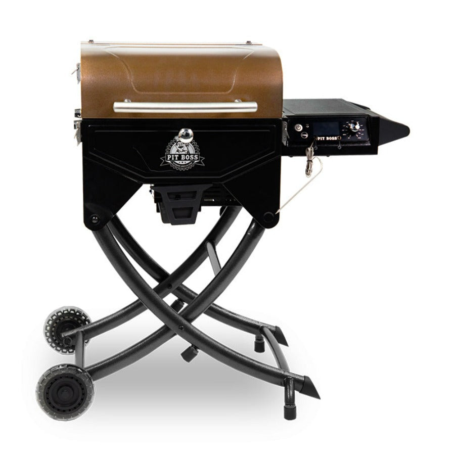 Orangeish-brown and black grill with silver accents and Pit Boss logo