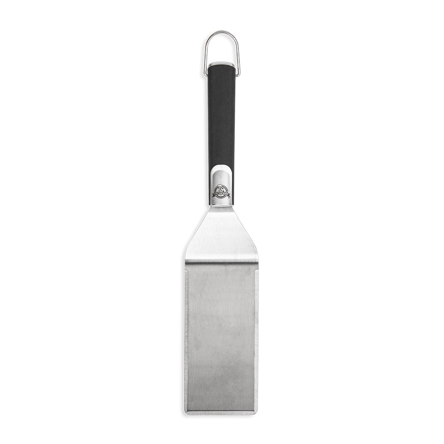 lifestyle_5, silver spatula with black handle and small pit boss logo